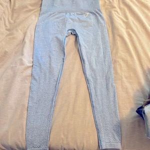 Worn only twice. Blue gym shark leggings size small.